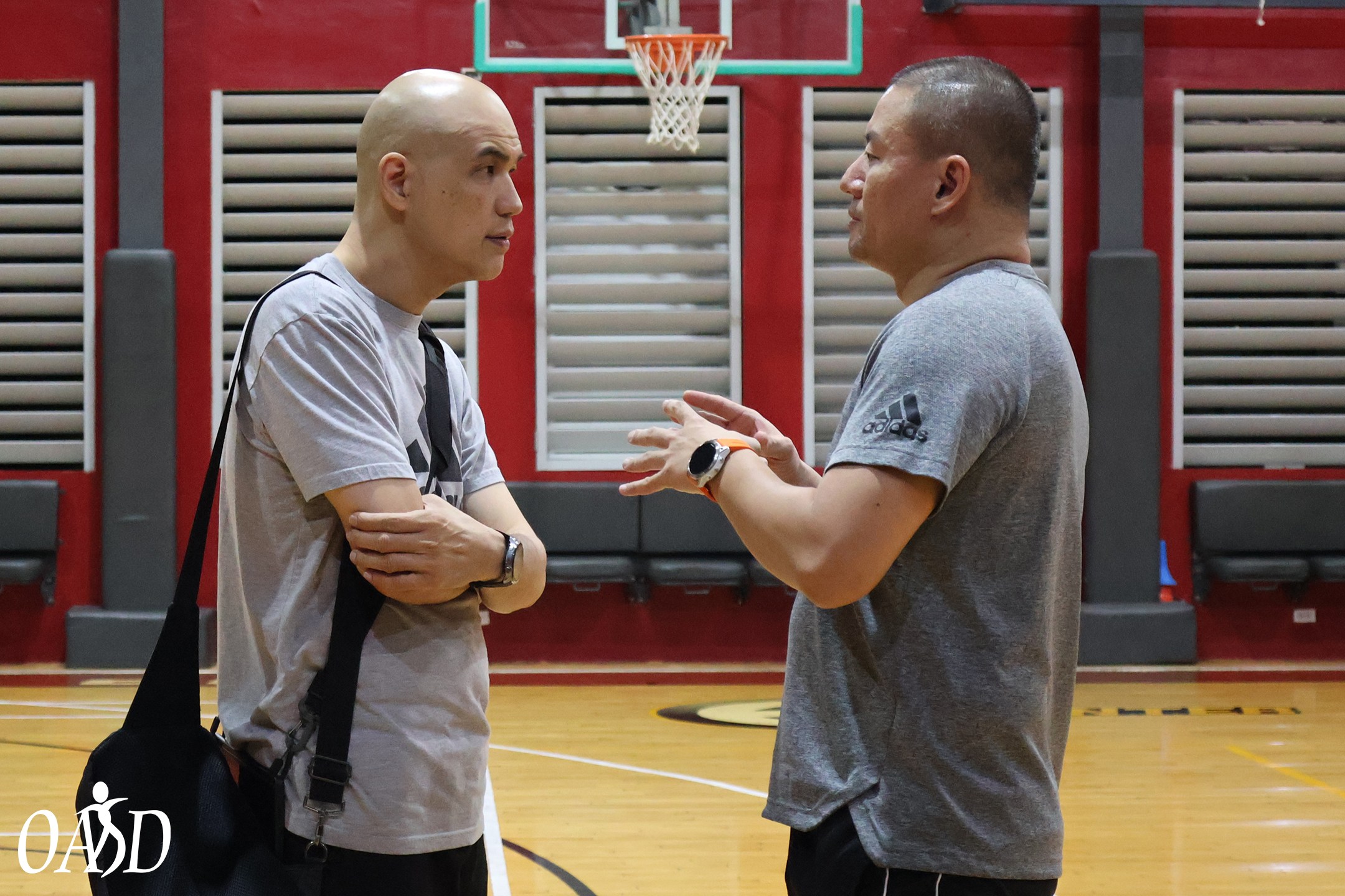 Dr. Obet Vital [left] with UP Lady Maroons head coach Benson Bocboc.